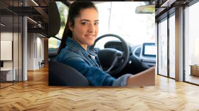 Woman driving her car. Wall mural