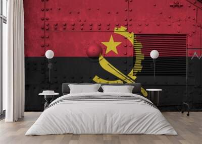 Angola flag depicted on side part of military armored tank closeup. Army forces conceptual background Wall mural