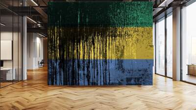 Gabon flag depicted in paint colors on old and dirty oil barrel wall closeup. Textured banner on rough background Wall mural