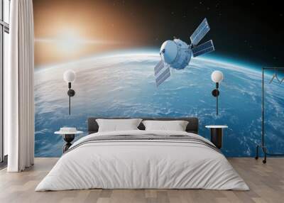 A small satellite floating on space with earth and sunlight on background Wall mural