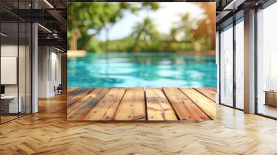 Abstract background with a wooden table top and a blurred swimming pool in the summer garden. A colorful wood floor for product display, a tropical beach, vacation concept. Wall mural