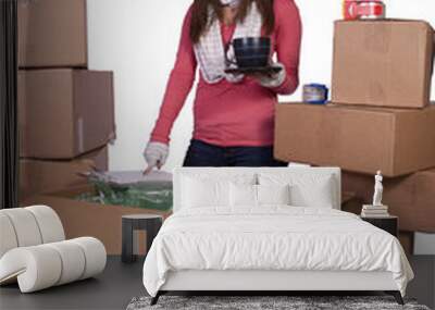 young girl packing up and moving - isolated Wall mural