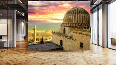 Artuklu Mardin, Turkey 7 May 2022 Mardin landscape at sunset with minaret of Ulu Cami, view from Zinciriye Madrasah Wall mural