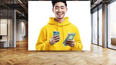 Winning, lottery, or partying Asian man with cash and a cell phone isolated on a transparent PNG backdrop. Happy male portrait holding cash to use for smartphone purchases, investments, or banking. Wall mural