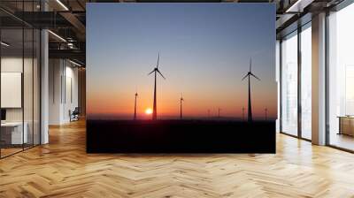 wind turbines at sunset Wall mural