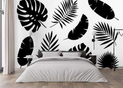 Black silhouettes of tropical palm leaves isolated on white background. Exotic plants leaves set. Vector illustration Wall mural