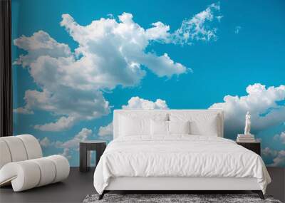 Clear blue sky with scattered white clouds on a sunny day Wall mural