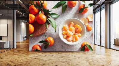 Fresh tangerines with stems and leaves Wall mural