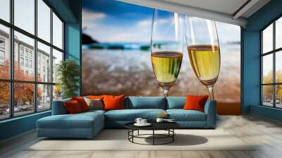 champagne glasses on tropical beach at sunset - exotic new year Wall mural