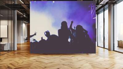 cheering crowd with raised hands at concert - music festival Wall mural