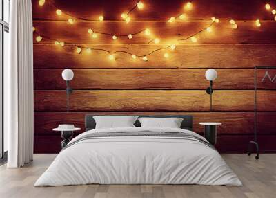 christmas string lights on old vintage wooden background Wall mural