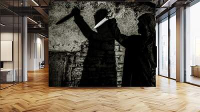 murderer with big knife and shadow horror scene Wall mural