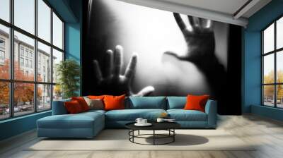 scary picture of hands behind glass Wall mural