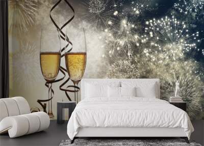 two champagne glasses with ribbons against holiday lights and fireworks - new year celebrations Wall mural