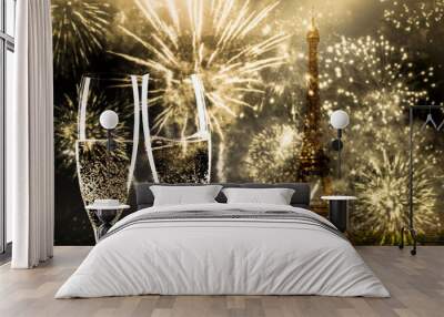 two glasses of champagne and Eiffel tower with fireworks New Year in Paris Wall mural