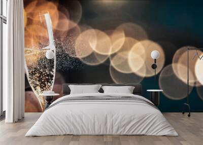 two glasses of champagne and holiday lights - new year celebration Wall mural