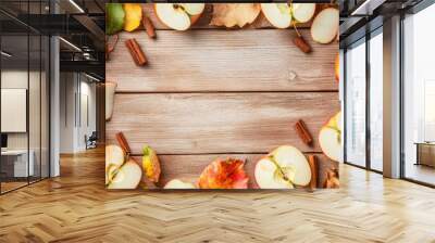 Frame with apples and cinnamon sticks with copyspace. Food background for autumn, fall or Christmas Wall mural