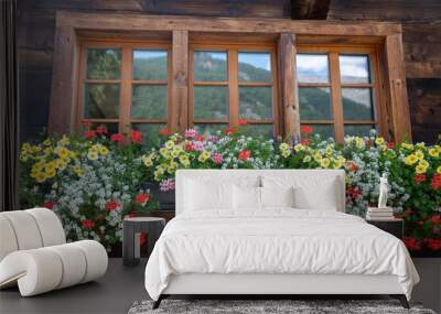 Picturesque chalet window with red flowers in flower box in Zermatt, Switzerland, during summertime Wall mural