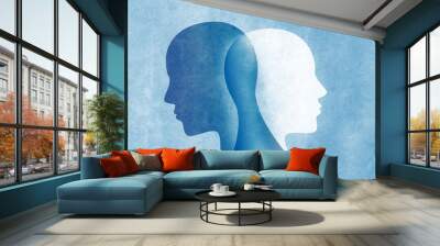 Bipolar disorder mind mental. Split personality. Mood disorder. Dual personality concept. Silhouette on blue background Wall mural