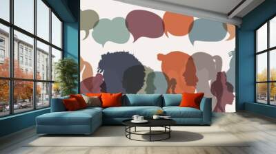 Communication between people of diverse cultures. Group of multicultural people talking. Crowd talking. Colored silhouette of side of various mixed race people. Speech bubble. Diversity Wall mural