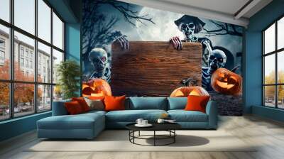 Halloween Card Party - Pumpkins And Zombies In Graveyard With Wooden Board Wall mural