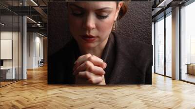 a woman is praying to god with hope Wall mural