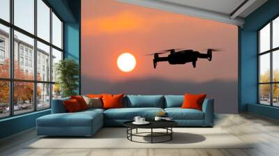 Drones are unmanned aerial vehicles (UAVs) or unmanned aircraft systems (UASes) most drones have cameras mounted on them to capture photo and video. Wall mural