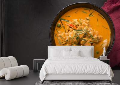 Thai curry red soup,Thailand tradition red curry with beef,pork or chicken menu in thai name is panaeng.Curry menu with coconut milk.Panaeng Curry on Wooden table Wall mural