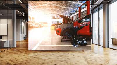 car in automobile repair service center with soft-focus and over light in the background Wall mural