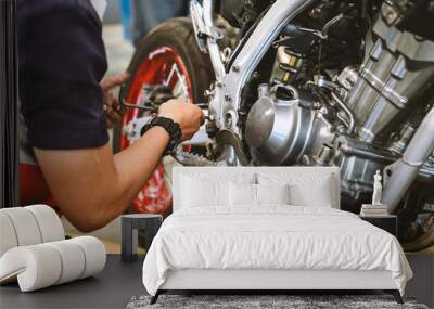 motorcycle engine repair with soft-focus and over light in the background Wall mural