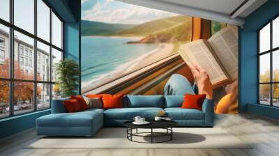 women reading book at train with beach view. summer travel vacation concept background Wall mural