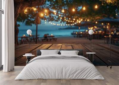 Empty wooden table with blurred beach bar at night Wall mural