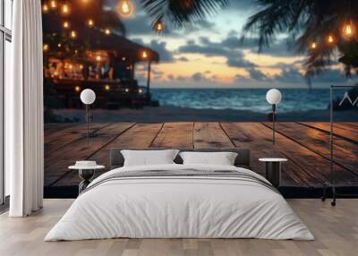 Empty wooden table with blurred beach bar at night Wall mural