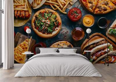 Unhealthy fast food with sauces on wooden table. Top view of various fast foods on the table.	 National fast food day background concept. Wall mural