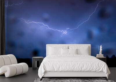 A thunderstorm produces horizontal and vertical lightning strikes with rainfall during stormy weather. Rain drops are on the lens. Wall mural