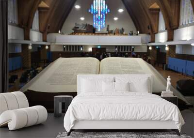 Old Bible on pulpit in a Protestant church Wall mural