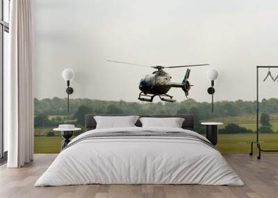 ec-120 helicopter hovering Wall mural