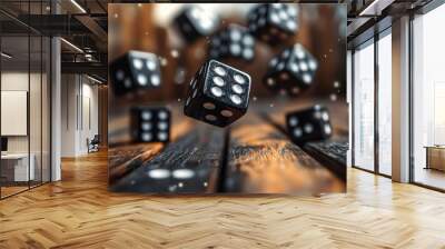 Black dice falling on a wooden table,  Concept of chance, gambling, and risk Wall mural