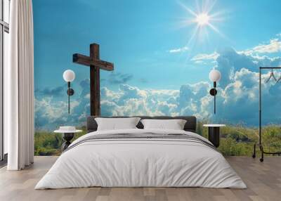 Wooden Cross on Green Hill Under Blue Sky Wall mural