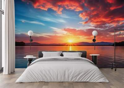 A serene sunset over a tranquil lake with vibrant hues in the sky, captured in a high-quality copy space image. Wall mural