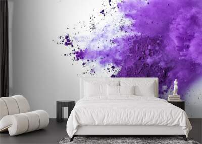 Capture dynamic purple color powder explosion on a white backdrop with copy space image. Wall mural