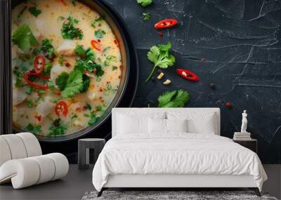 Tom Kha Kai a flavorful Thai soup with chicken cooked in coconut milk perfect for the recipe website s copy space image Wall mural