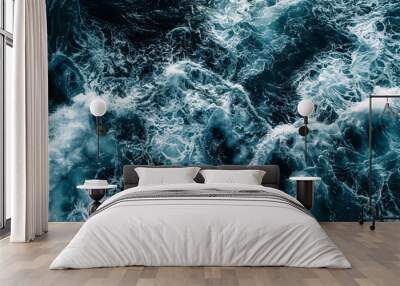 A large wave crashing into the shore Wall mural