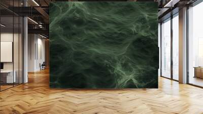 The image is of a body of water with green waves Wall mural