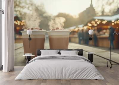 Two cups of hot chocolate on a table in front of a crowd of people Wall mural