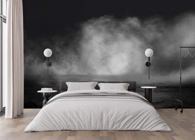 Grunge concrete floor with smoke or fog in dark room with spotlight. Asphalt night street, black background, black and white Wall mural