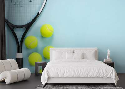 Tennis ball and racket isolated background. Top view Wall mural