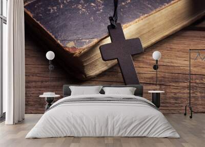 closeup of wooden christian cross on bible Wall mural