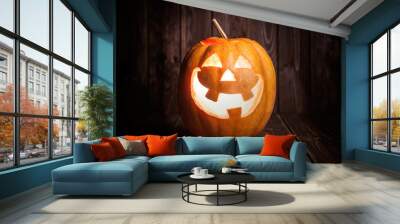 jack-o-lantern on wooden background Wall mural