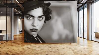 black and white retro photograph of a woman in the prohibition era with an intense look in her eyes Wall mural